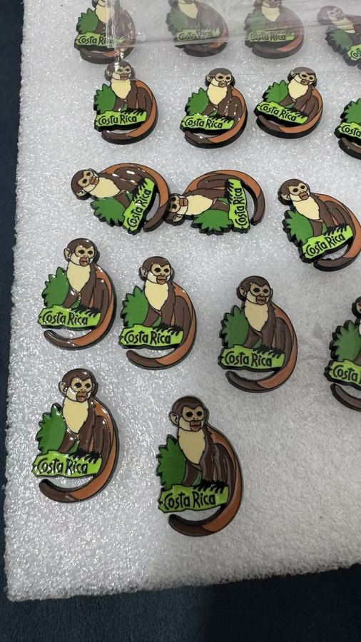 Enamel pins and badges